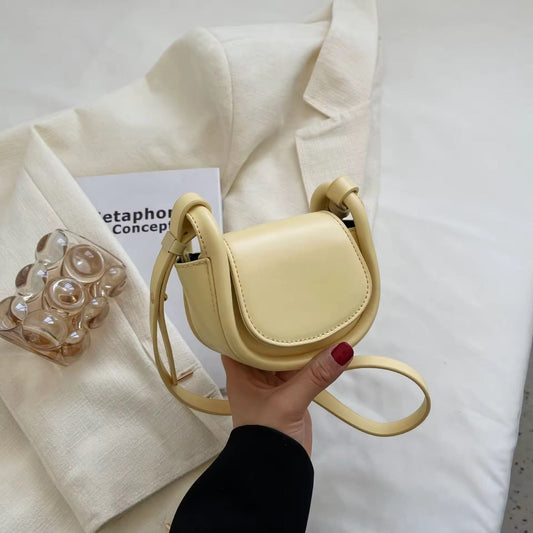 Minimalist White Saddle Crossbody Bag  Compact Leather Shoulder Purse (14×11×10 cm)